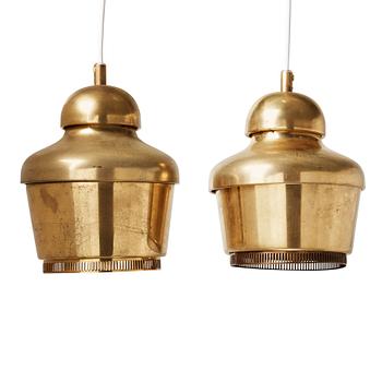 84. A pair of Alvar Aalto 'A330' brass pendant lamps, Valaistustyö, Finland.