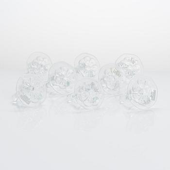 Kerttu Nurminen, a set of nine 'Kerttu' glass napkin rings, Nuutajärvi Finland. Design year 1978.