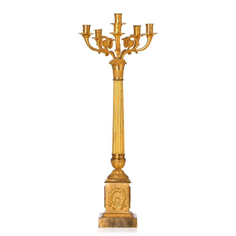 A French late Empire gilded six-light candelabra, mid 19th century.