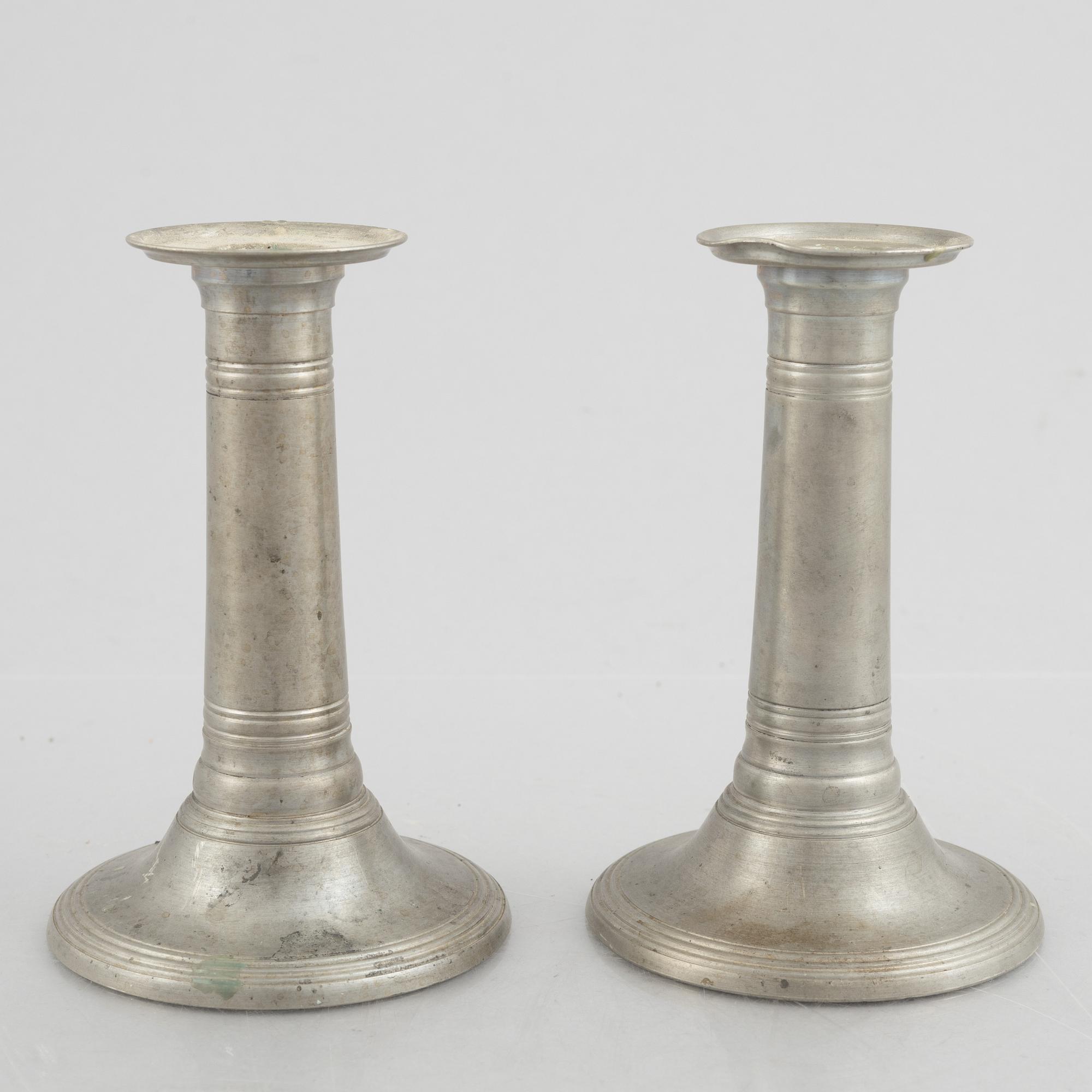 A pair of pewter candle sticks, model A702, Firma Svenskt Tenn, Sweden, 1928.