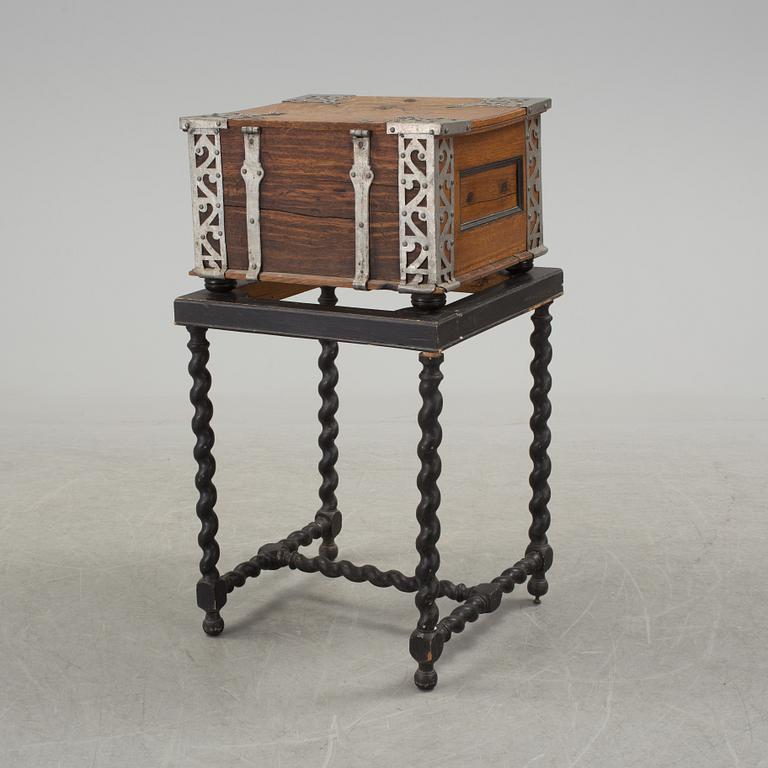 A baroque case on later stand.