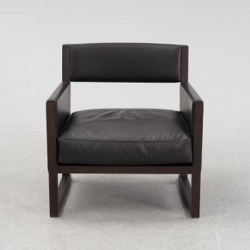 A 'Musa' easy chair by Antonio Citterio for Maxalto, designed 2006.