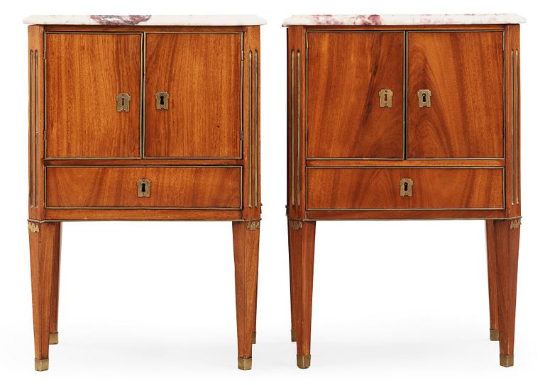 A pair of late Gustavian late 18th century chamber pot cupboards.