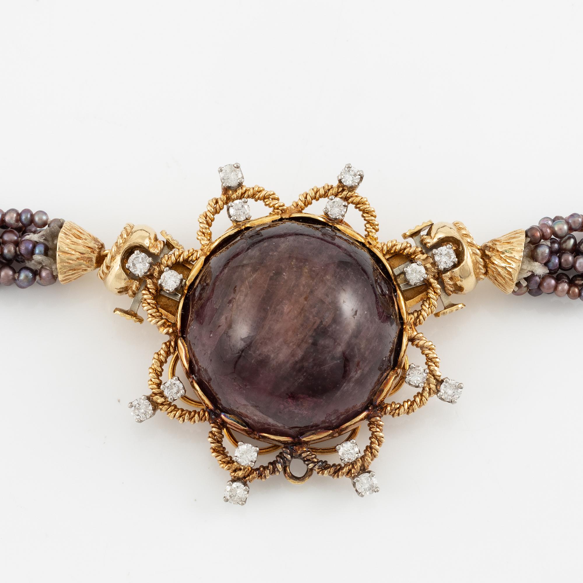 Multi-strand pearl necklace with two clasps set with carved coral, cabochon-cut tourmaline, and brilliant-cut diamonds.