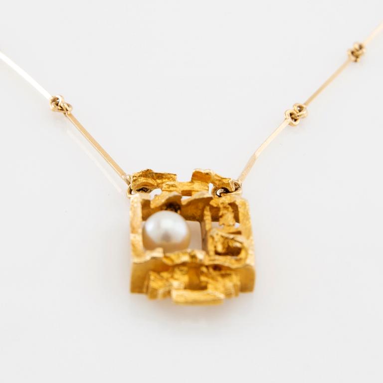 Björn Weckström, Halsband "Taikahelmi/Magisk pärla", 18K guld och odlad pärla, Lapponia.