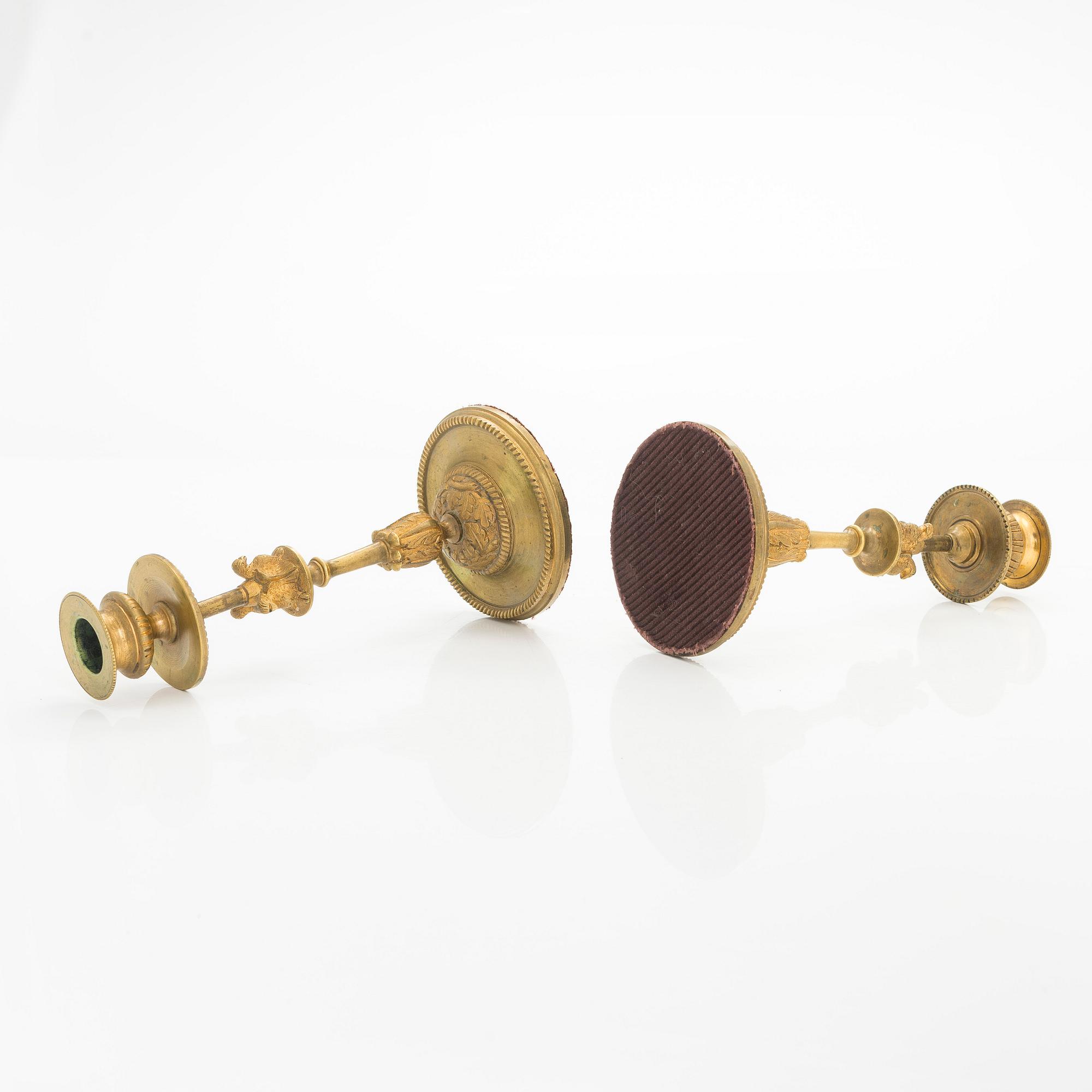 A pair of early 20th century candlesticks.