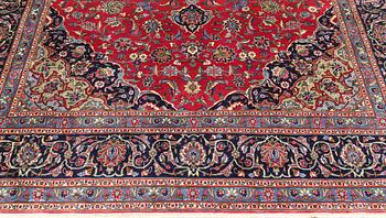 A Mashad carpet, ca 332 x 245 cm.