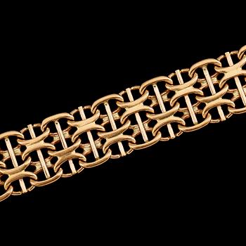 ARMBAND, 18 k guld, svenska stämplar, 1964. Vikt ca 32 g.