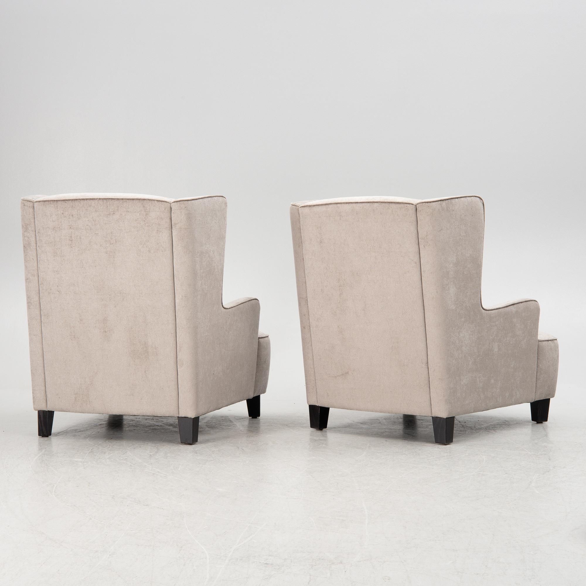 A pair of easy chairs, 21st century.