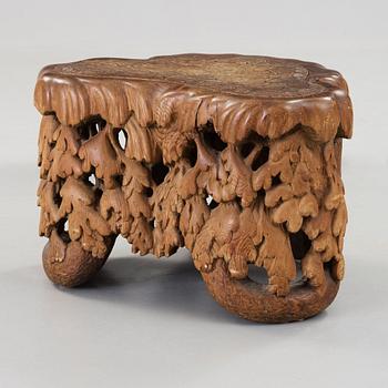 Knut Fjaestad, an Art Nouveau sculptured pine table/stool, Sweden ca 1900.