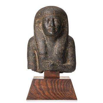 158. An Egyptian black granite bust of a man, 19th century or older.