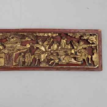 A group of three Chinese wooden panels, late Qing dynasty / around 1900.
