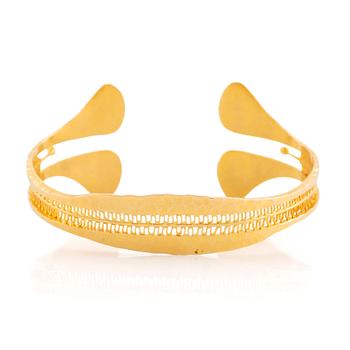 469. An 18K gold Tapio Wirkkala bracelet.