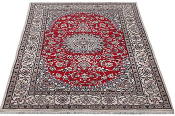 A Nain carpet, part silk, 9 laa, c. 303 x 198 cm.