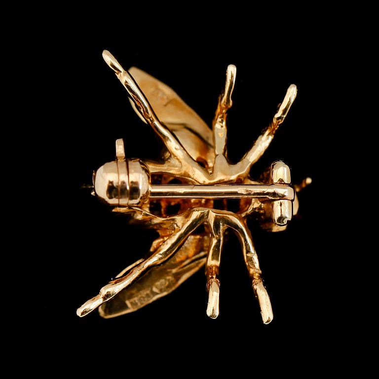 BROSCH, 18K guld, diamanter och blå safirer.