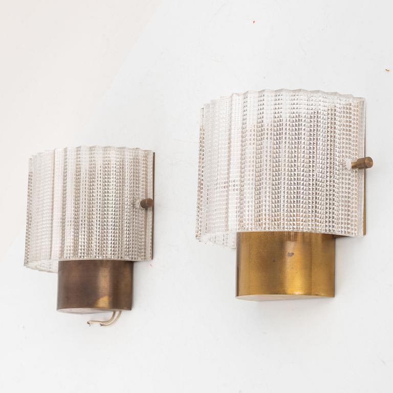 Carl Fagerlund, a pair of wall lamps, Orrefors, mid-20th century.