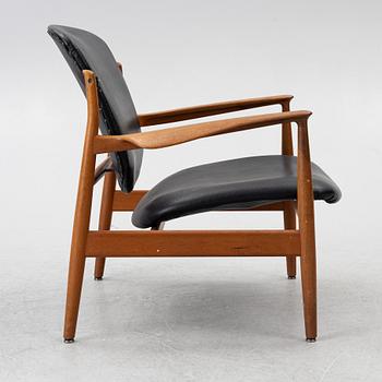 Finn Juhl, A 'FD 136' easy chair, France & Daverkosen, Denmark 1950s.