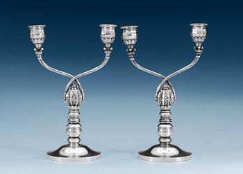 639. A pair of Johan Rohde sterling candelabra, design nr 343, by Georg Jensen, Copenhagen, 1933-44,