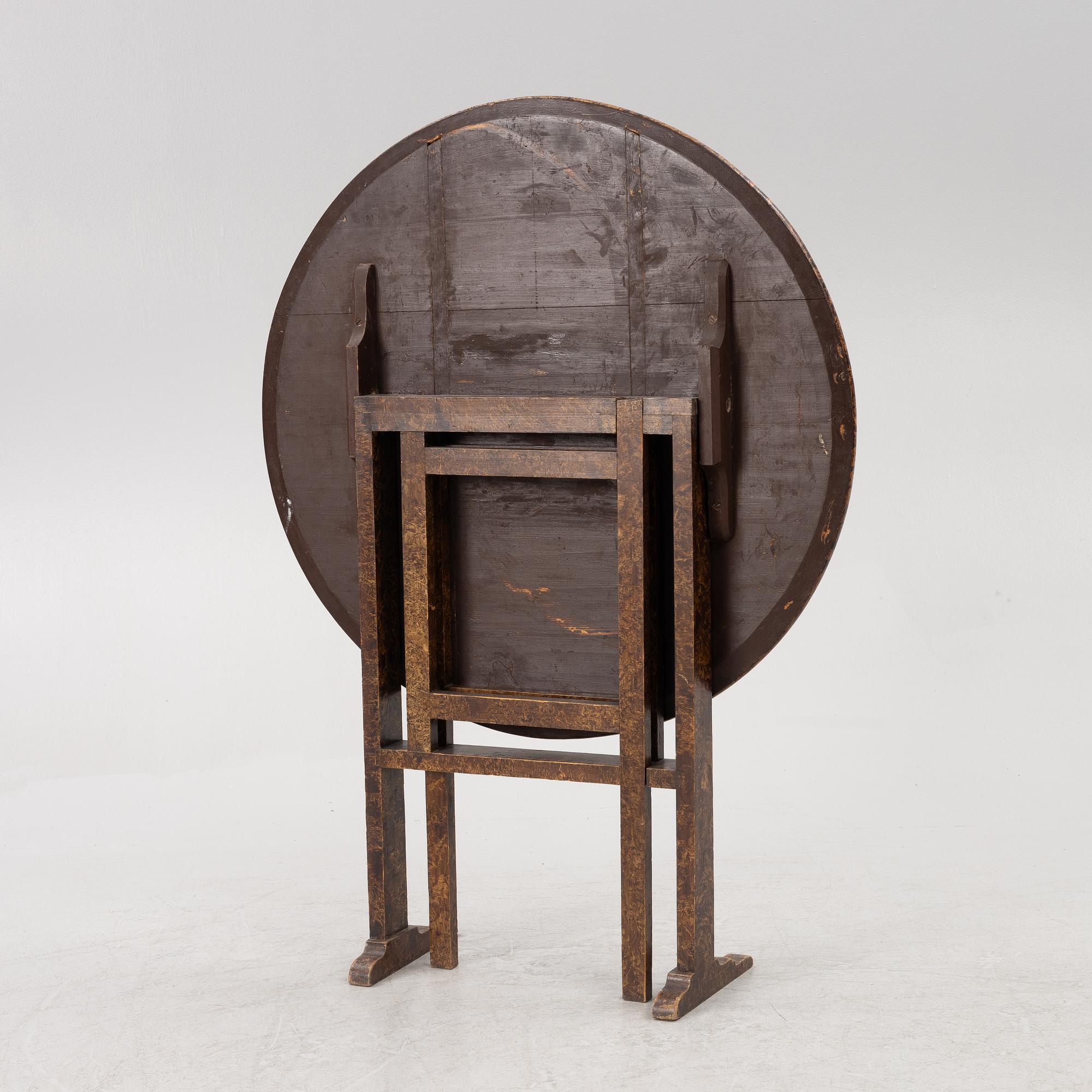A folding table, 19th Century.