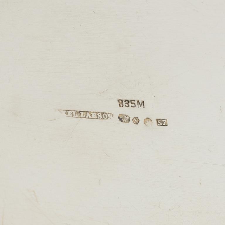 A silver coffee pot, creamer and sugar bowl, import marks of Axel Larson, Helsingborg 1920.