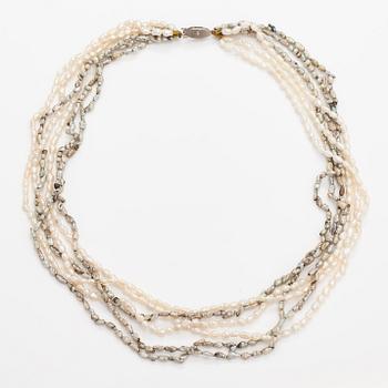 A six-strand pearlcollier with cultured pearls and a metal clasp.