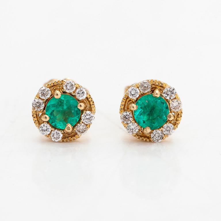 A pair of earrings and a chain ca 18K gold, and a pendant ca 14K gold with emeralds and diamonds ca 0.24 ct in total.