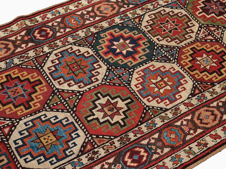 An antique Moghan 'Long rug', Kazak region South Caucasus, ca 360 x 106,5 cm.