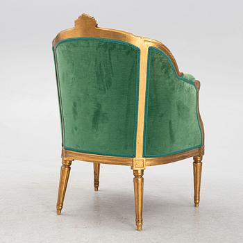 A Gustavian style armchair, circa 1900.