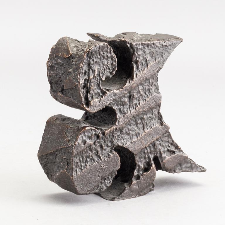 An signed and numbered bronze sculpture '23' by Carl Fredrik Reuterswärd.