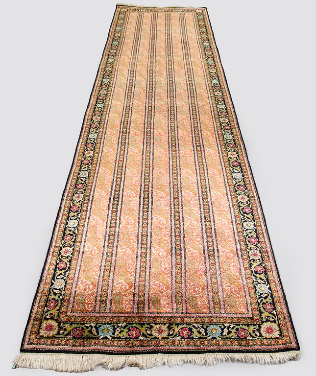 A runner, Ghom, silk. Approx. 100 x 425 cm.