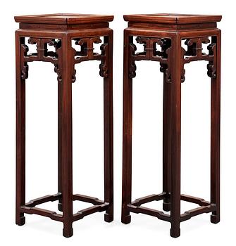 1676. A set of two hardwood pedestals, presumably late Qing dynasty.