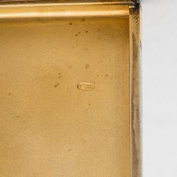 A gilded silver cigarette case with enamel and rose-cut diamonds. Moscow, early 20th century.