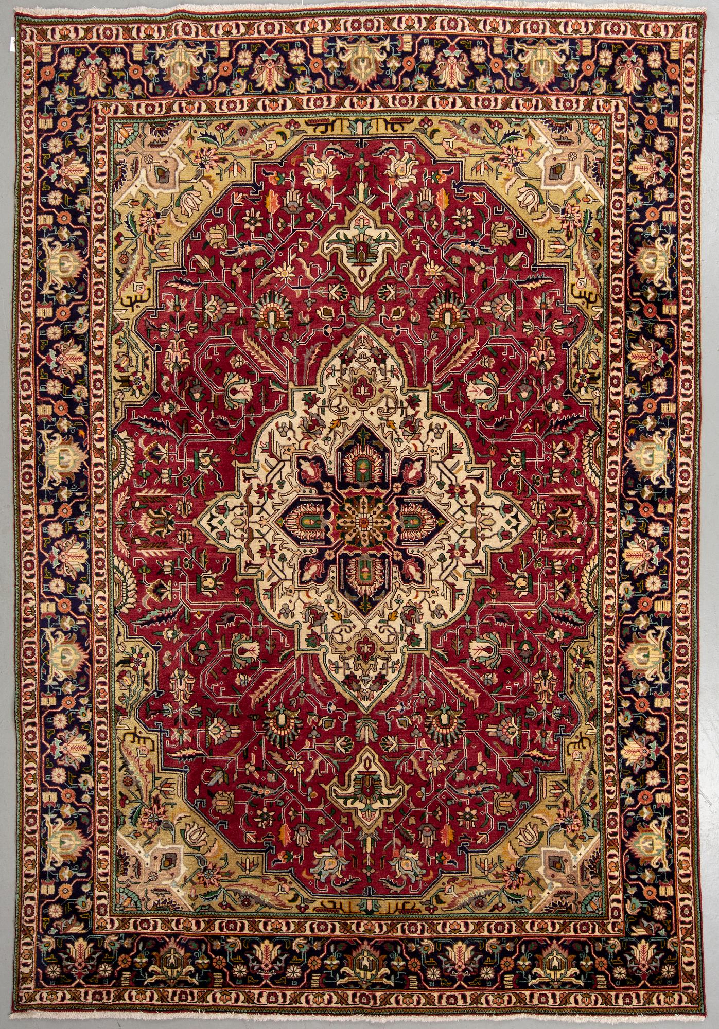 A carpet, Tabriz, ca 345 x 240 cm.