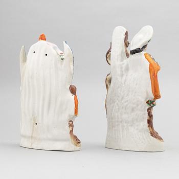 A set of eight English flintware figurines, 20th Century.
