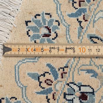 A Nain rug, diameter 243 cm.