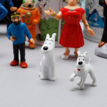 TIN TIN, parti, bl a affischer och figurer, 1900-talets andra hälft.