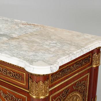 A Louis XVI style chest of drawers, second half of the 20th century.