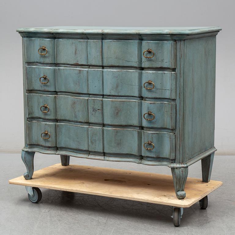 a baroque style chest of drawers from the 19th century.