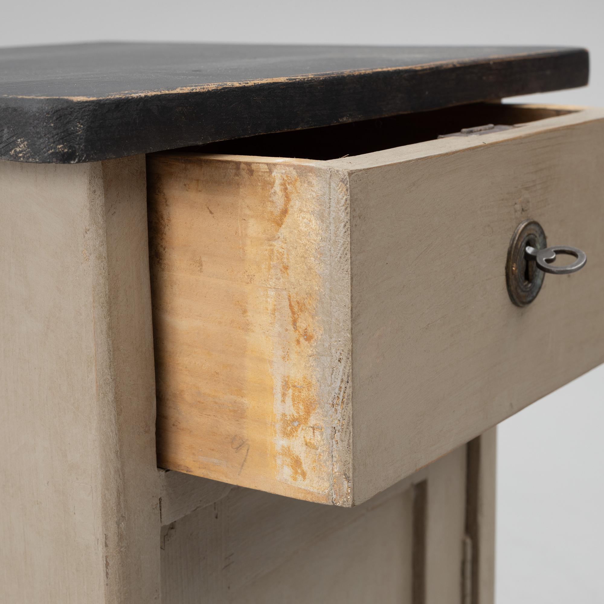 A pair of bedside tables, early 20th Century.