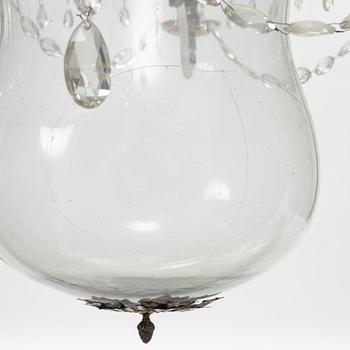 An Empire-style glass ceiling lantern, around the year 1900.