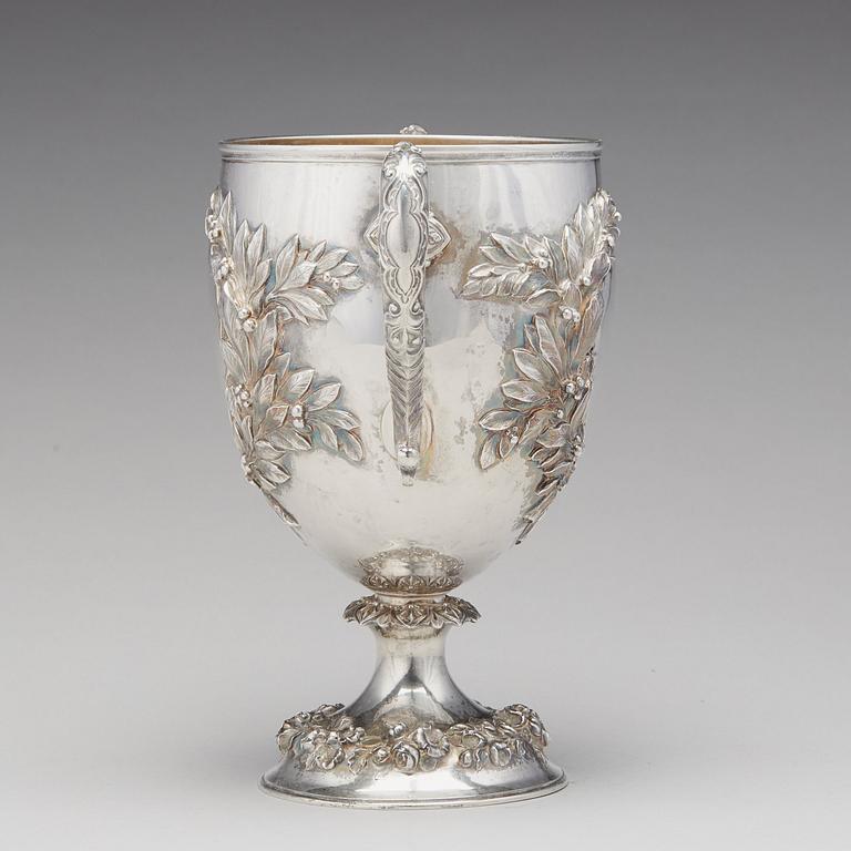 An English 19th century parcel-gilt silver cup, mark of Robert Hennell, London 1863.