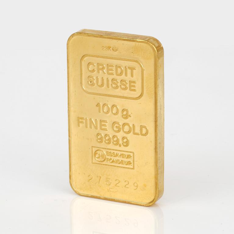 GULDTACKA, 23 k, vikt 100 g, Credit Suisse.
