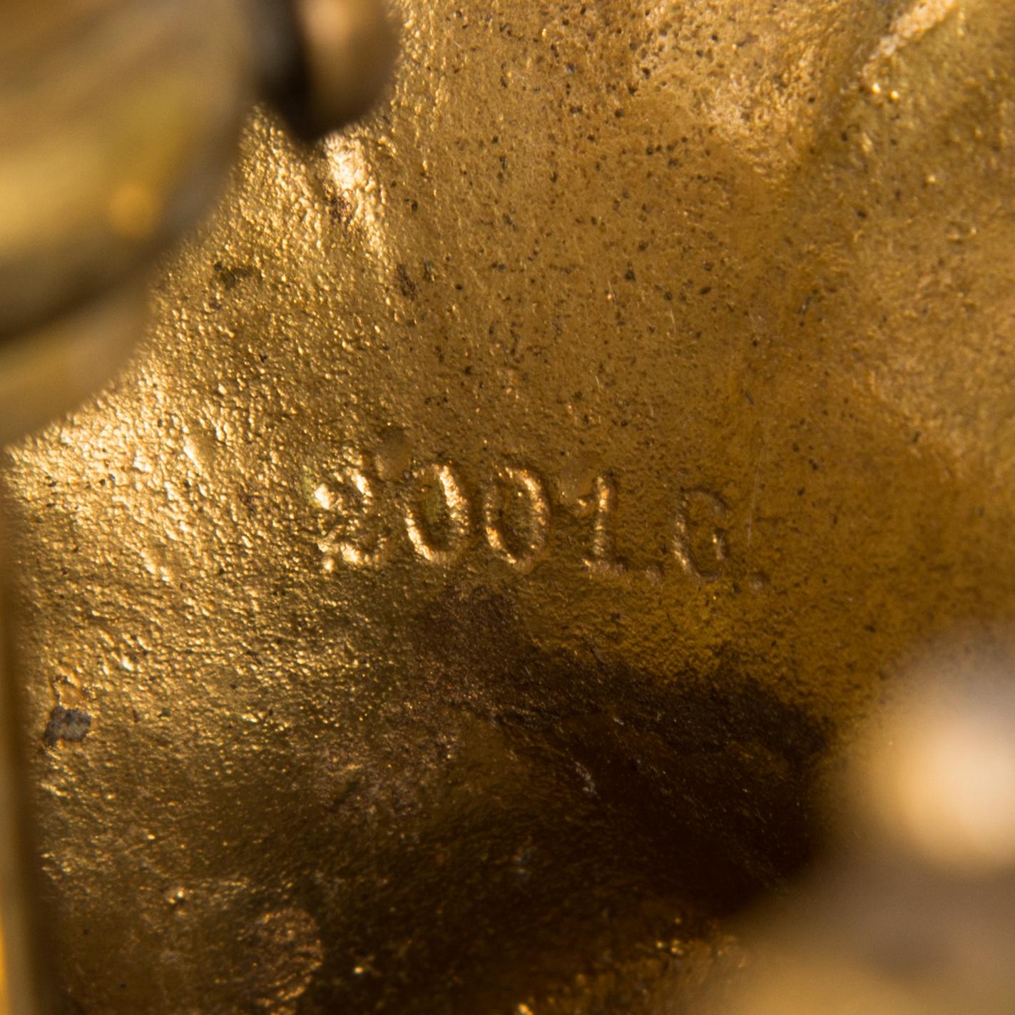 A brass chandelier with prisms, second half of the 19th century. Height 83 cm.