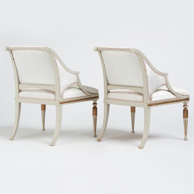 A pair of late Gustavian armchairs by E Ståhl (master in Stockholm 1794-1820).