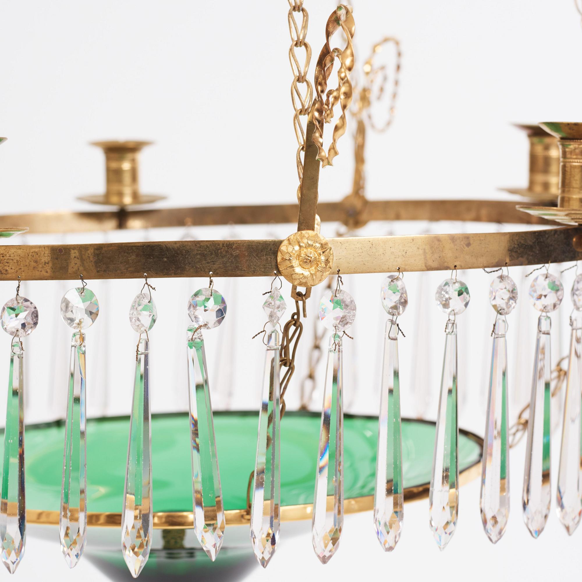A late Gustavian gilt-brass and green glass six-light chandelier, late 18th century.