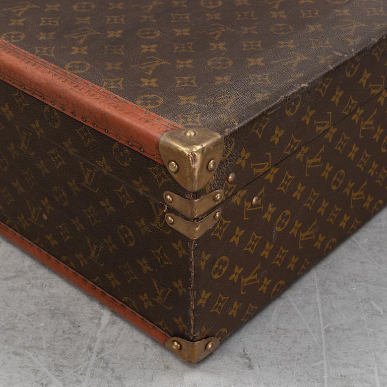 Louis Vuitton, a monogram canvas 'Bracken' suitcase, mid 20th Century.