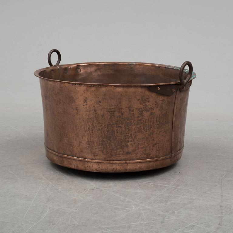 A 19th century copper cauldron.