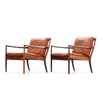 113. A pair of Ib Kofod Larsen 'Samsö' palisander and brown leather armchairs, Olof Persson Möbler, Sweden 1960's.