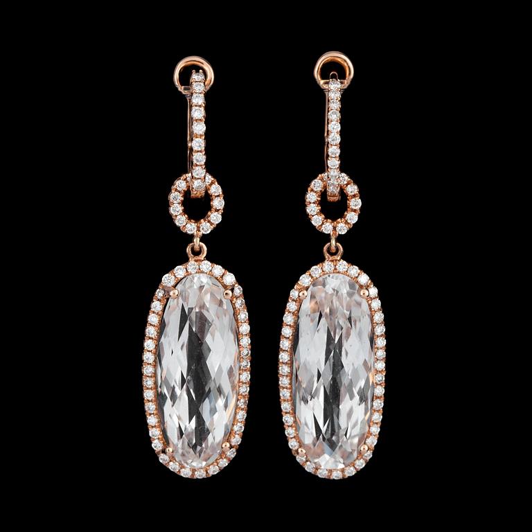A pair of brilliant-cut diamond and white topaz earrings. Diamonds total carat weight circa 4.30 cts.