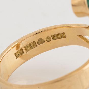18K gold brilliant cut diamond and  cabochon cut emerald ring.